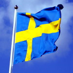 616px-Swedish_flag_with_blue_sky_behind_ausschnitt[1]